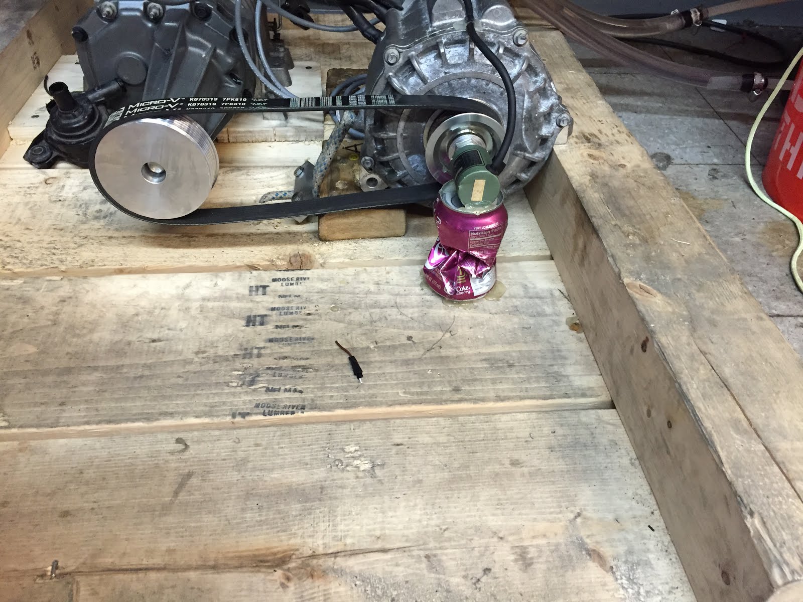 A cherry Coke can was used to hold the encoder